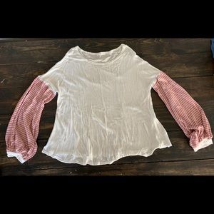 White shirt with pink and white striped sleeves